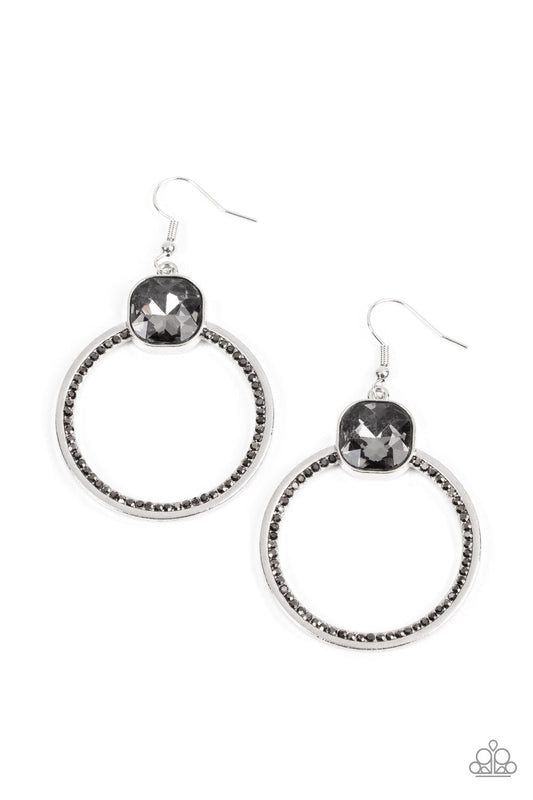 Paparazzi Accessories Cheers To Happily Ever After - Silver An oversized smoky gem sits atop a silver hoop with an inner ring encrusted in glitzy hematite rhinestones, resulting in a timeless twinkle. Earring attaches to a standard fishhook fitting. Sold