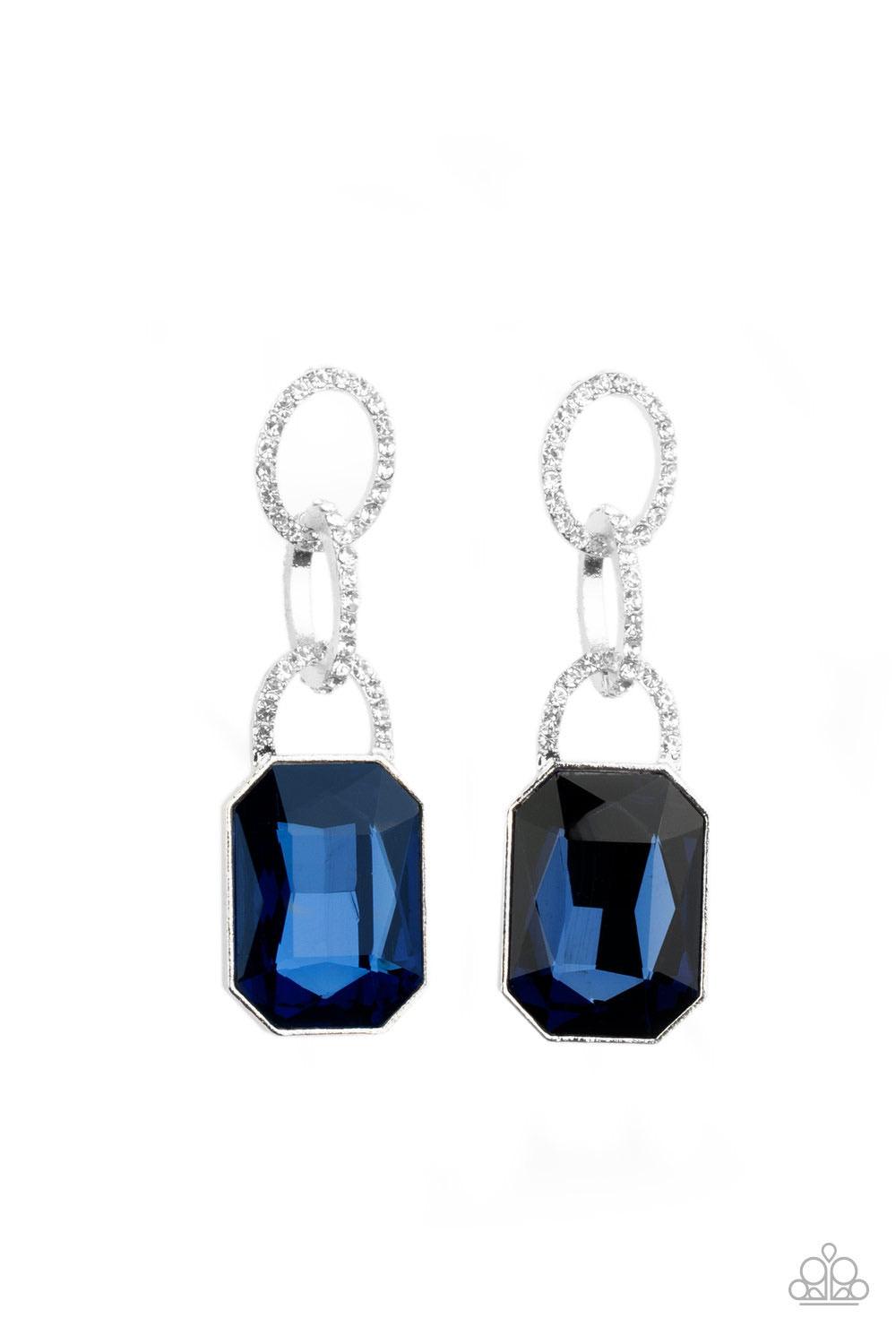 Paparazzi Accessories Superstar Status - Blue An oversized blue emerald-cut rhinestone swings from the bottom of white rhinestone encrusted links, creating a gorgeously dramatic lure. Earring attaches to a standard post fitting. Sold as one pair of post e