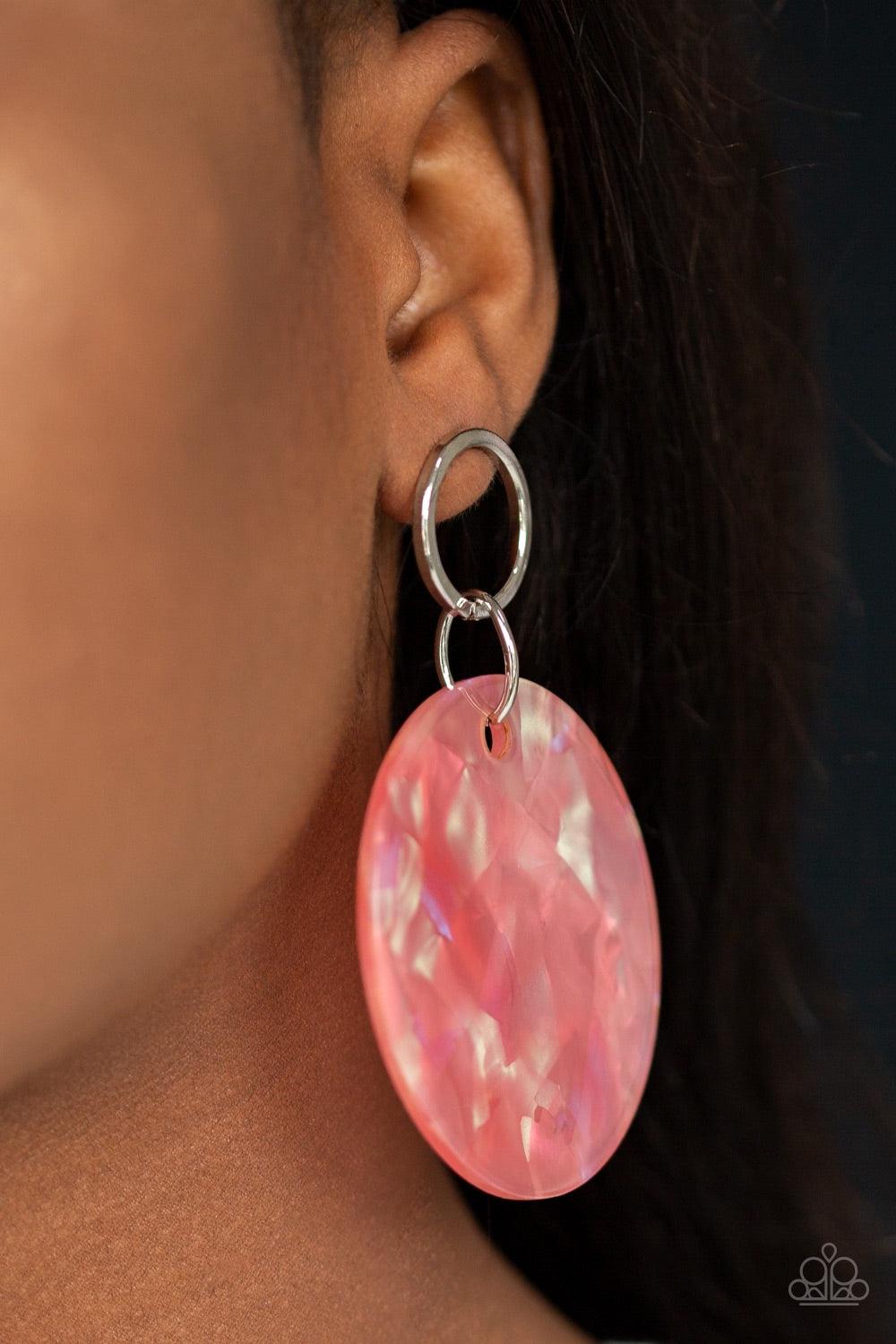 Paparazzi Accessories Beach Bliss - Orange Brushed in a shell-like iridescence, a shimmering acrylic frame swings from the bottom of a dainty silver hoop for a summery flair. Earring attaches to a standard post fitting. Jewelry
