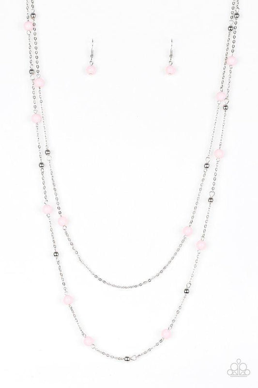 Paparazzi Accessories Beach Party Pageant - Pink Pretty pink and dainty silver beads trickle along two shimmery silver chains, creating colorful layers down the chest. Features an adjustable clasp closure. Sold as one individual necklace. Includes one pai