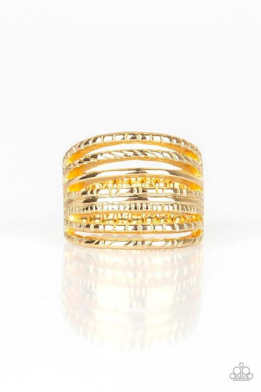 Paparazzi Accessories Basic Maverick - Gold A collection of smooth and textured gold bars arc across the finger, stacking into a thick layered band. Features a stretchy band for a flexible fit. Sold as one individual ring. Jewelry