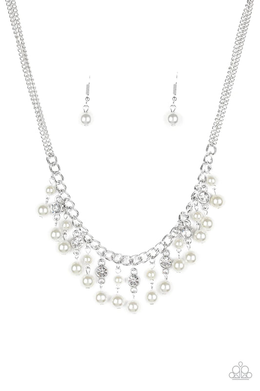 Paparazzi Accessories Regal Refinement - White Alternating with glassy white rhinestones, pearly white beaded tassels swing from the bottom of a shimmery silver chain below the collar for a refined flair. Features an adjustable clasp closure. Sold as one