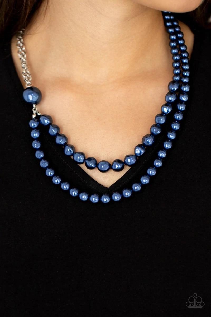 Paparazzi Accessories Remarkable Radiance - Blue A dramatically oversized blue pearl gives way to two mismatched strands of classic blue pearls that graduate in size and imperfect finishes, adding a timeless twist to the classic pearl palette. Features an