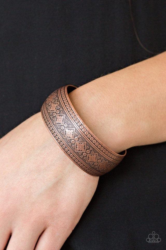 Paparazzi Accessories Gorgeously Gypsy - Copper Embossed in whimsical floral patterns, an ornate copper cuff curls around the wrist for a seasonal look. Sold as one individual bracelet. Jewelry