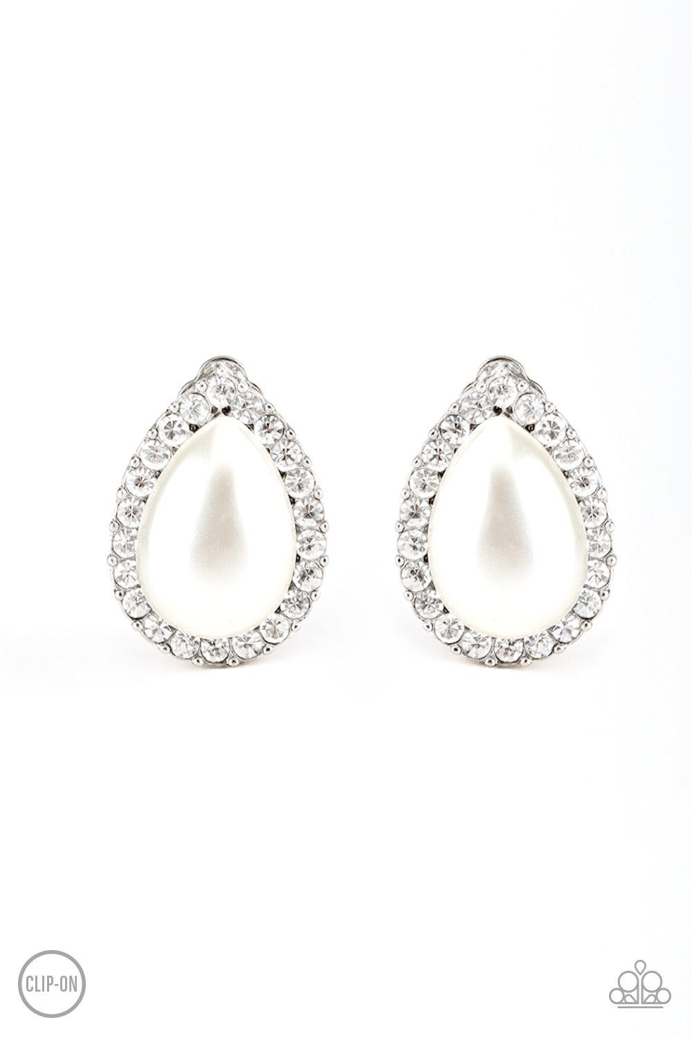 Paparazzi Accessories Old Hollywood Opulence - White *Clip-On A ring of glassy white rhinestones spins around a pearly teardrop bead center, creating a timeless frame. Earring attaches to a standard clip-on earring. Sold as one pair of clip-on earrings. J