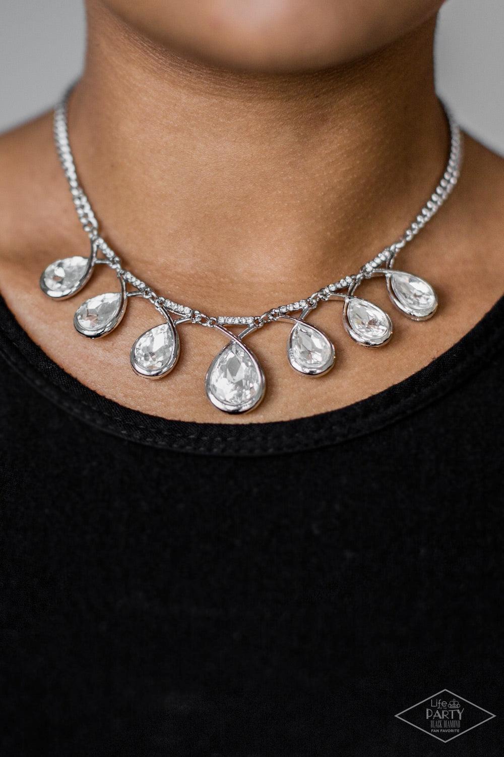Paparazzi Accessories Love At FIERCE Sight - White Suspended by glittery links, large teardrop gems drip below the collar, creating a dramatic fringe. Swooping silver bars spin around the faceted teardrops, adding a shiny metallic finish to the fierce cen