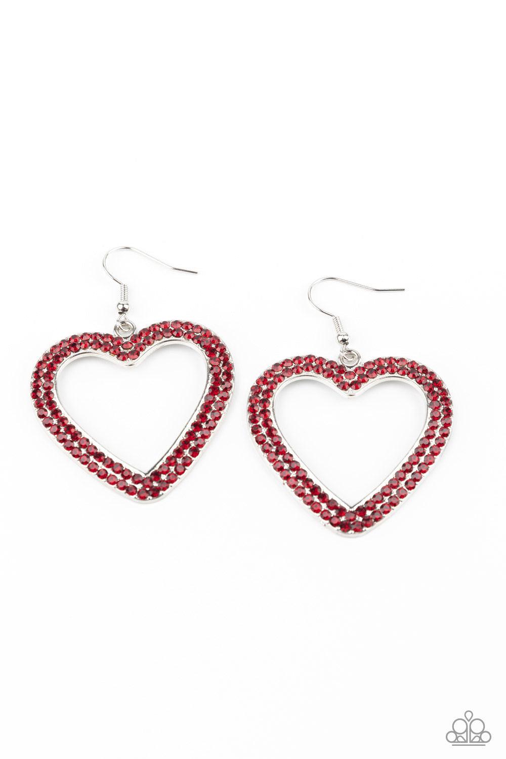 Paparazzi Accessories GLISTEN To your Heart - Red Two rows of fiery red rhinestones are encrusted along the front of a silver heart frame, creating a flirty centerpiece. Earring attaches to a standard fishhook fitting. Sold as one pair of earrings. Jewelr
