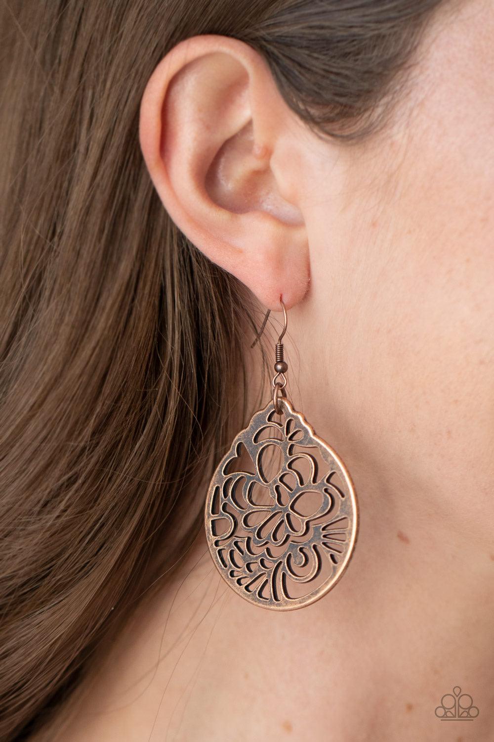 Paparazzi Accessories Garden Mosaic - Copper Brushed in an antiqued shimmer, a round copper frame is stenciled in an airy floral cut-out pattern for a whimsical look. Earring attaches to a standard fishhook fitting. Sold as one pair of earrings. Jewelry