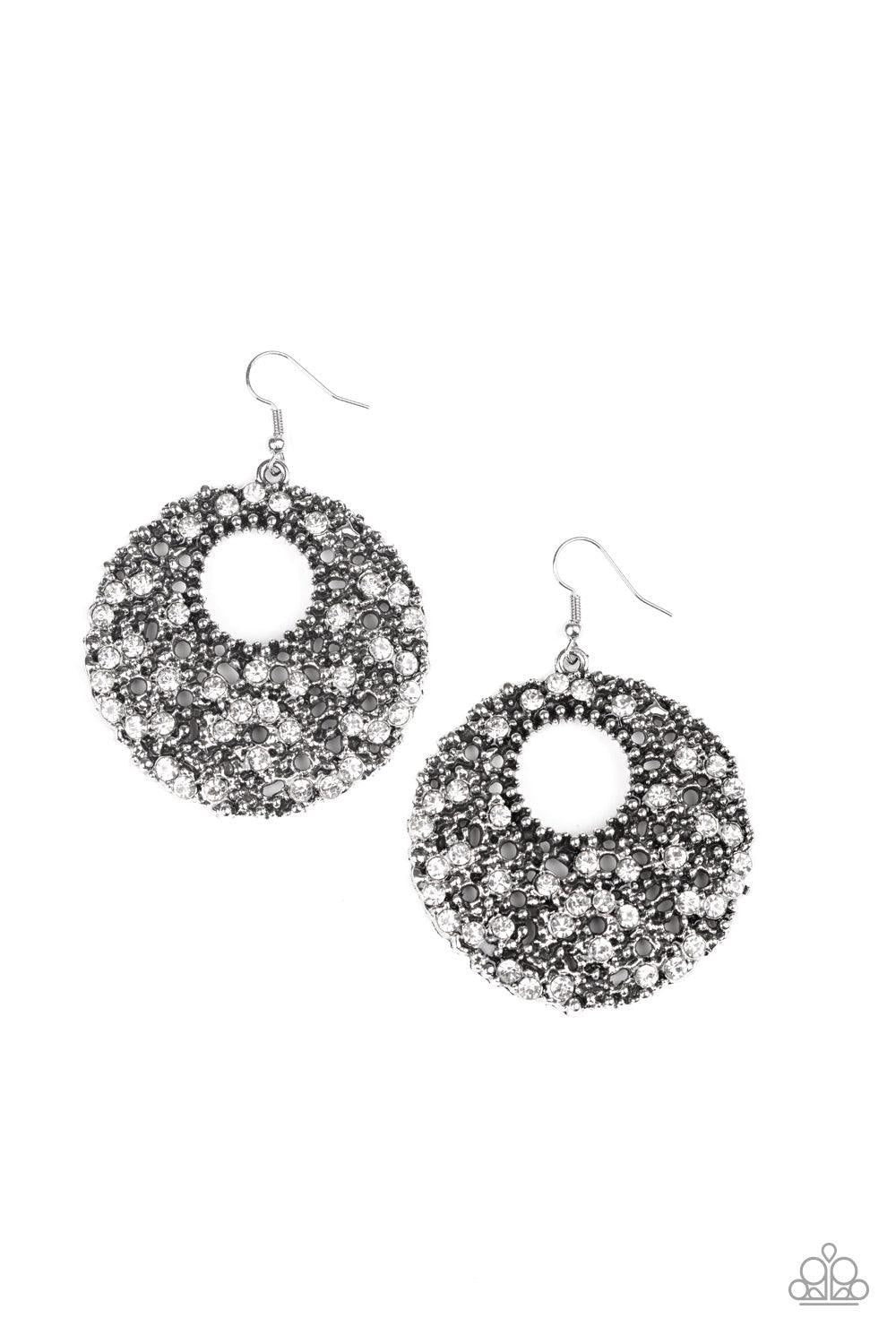 Paparazzi Accessories Starry Showcase - Black A collision of antiqued silver studs and glassy white rhinestones coalesce into a stellar hoop for an edgy look. Earring attaches to a standard fishhook fitting. Jewelry
