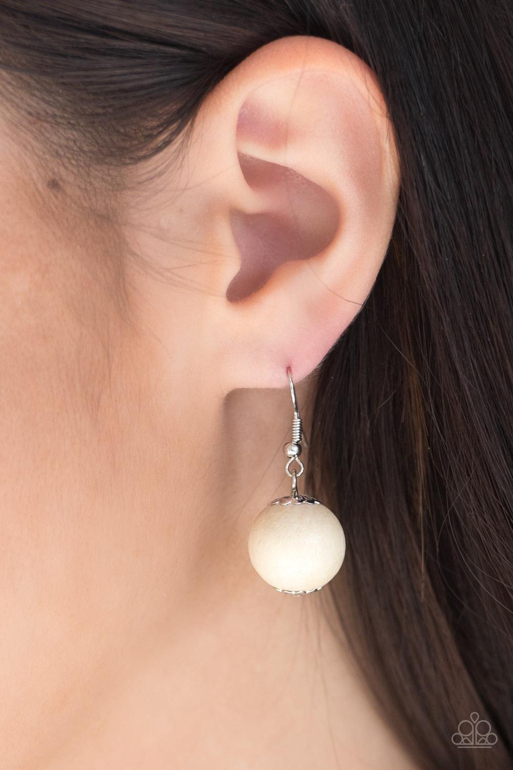 Paparazzi Accessories Effortlessly Everglades - Off White Gradually increasing in size near the center, refreshing white wooden beads are threaded along a white string for a summery look. Features an adjustable sliding knot closure. Jewelry