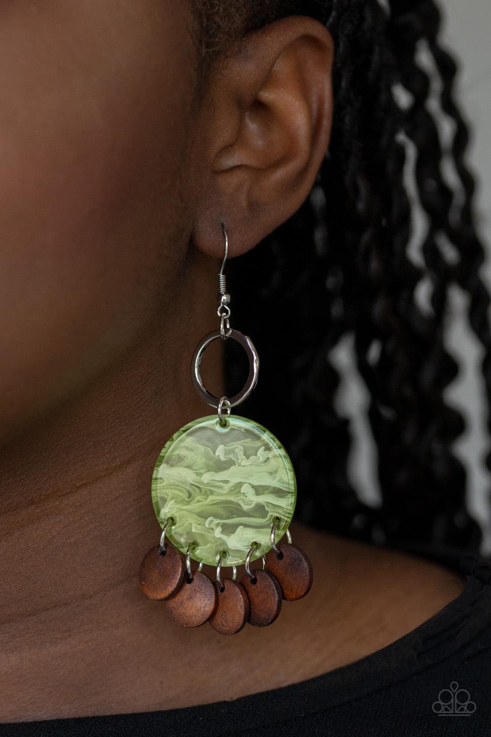 Paparazzi Accessories Beach Waves - Green Brown wooden discs dangle from the bottom of a green acrylic frame that attaches to a shimmery silver ring, creating a beach inspired look. Earring attaches to a standard fishhook fitting. Sold as one pair of earr