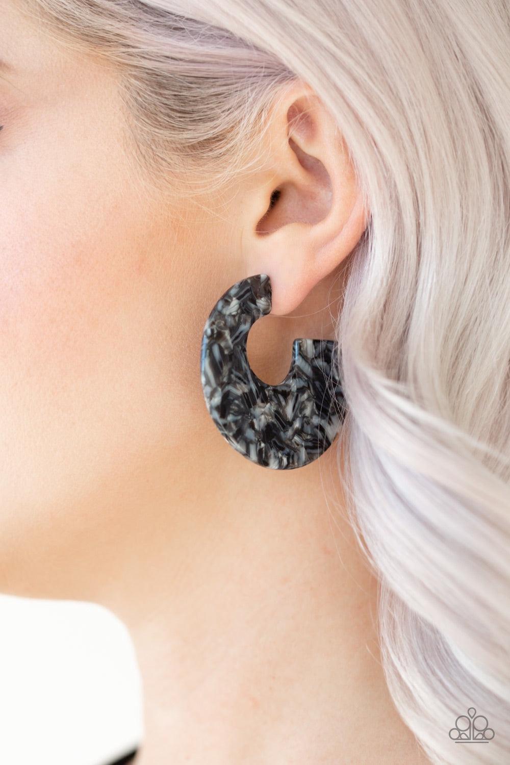 Paparazzi Accessories Tropically Torrid - Black Brushed in a colorful faux marble finish, a flat black hoop curls around the ear for a retro look. Earring attaches to a standard post fitting. Hoop measures 2" in diameter. Jewelry