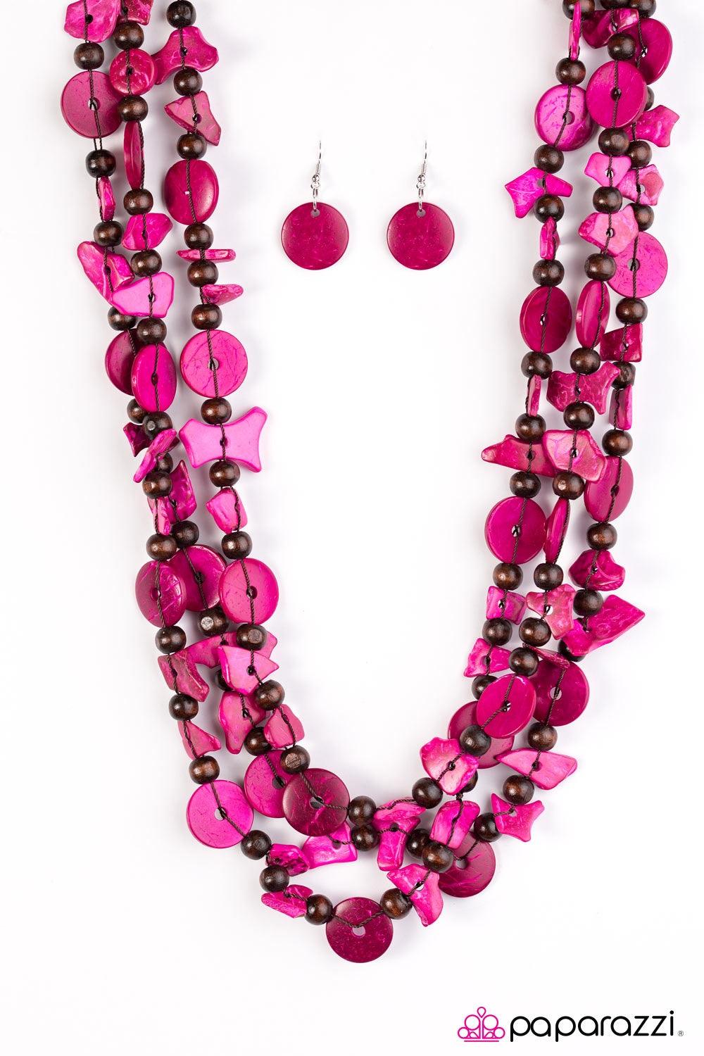 Paparazzi Accessories Living The Tropical Life - Pink Tinted in vivacious pink hues, bits of wooden beads and discs join earthy wooden beads along an elongated strand of thread. Try double-wrapping or even triple-wrapping around the neck for a colorfully