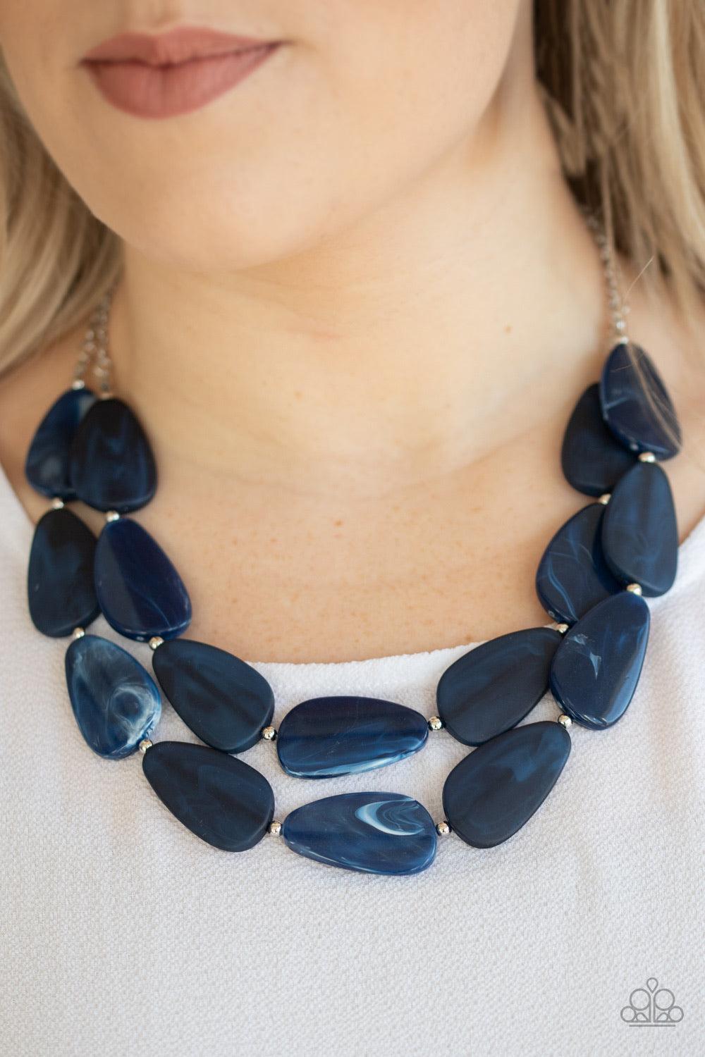 Paparazzi Accessories Colorfully Calming - Blue Featuring a faux marble finish, asymmetrical blue teardrops and dainty silver beads are threaded along invisible wires, creating two serene layers below the collar. Features an adjustable clasp closure. Jewe