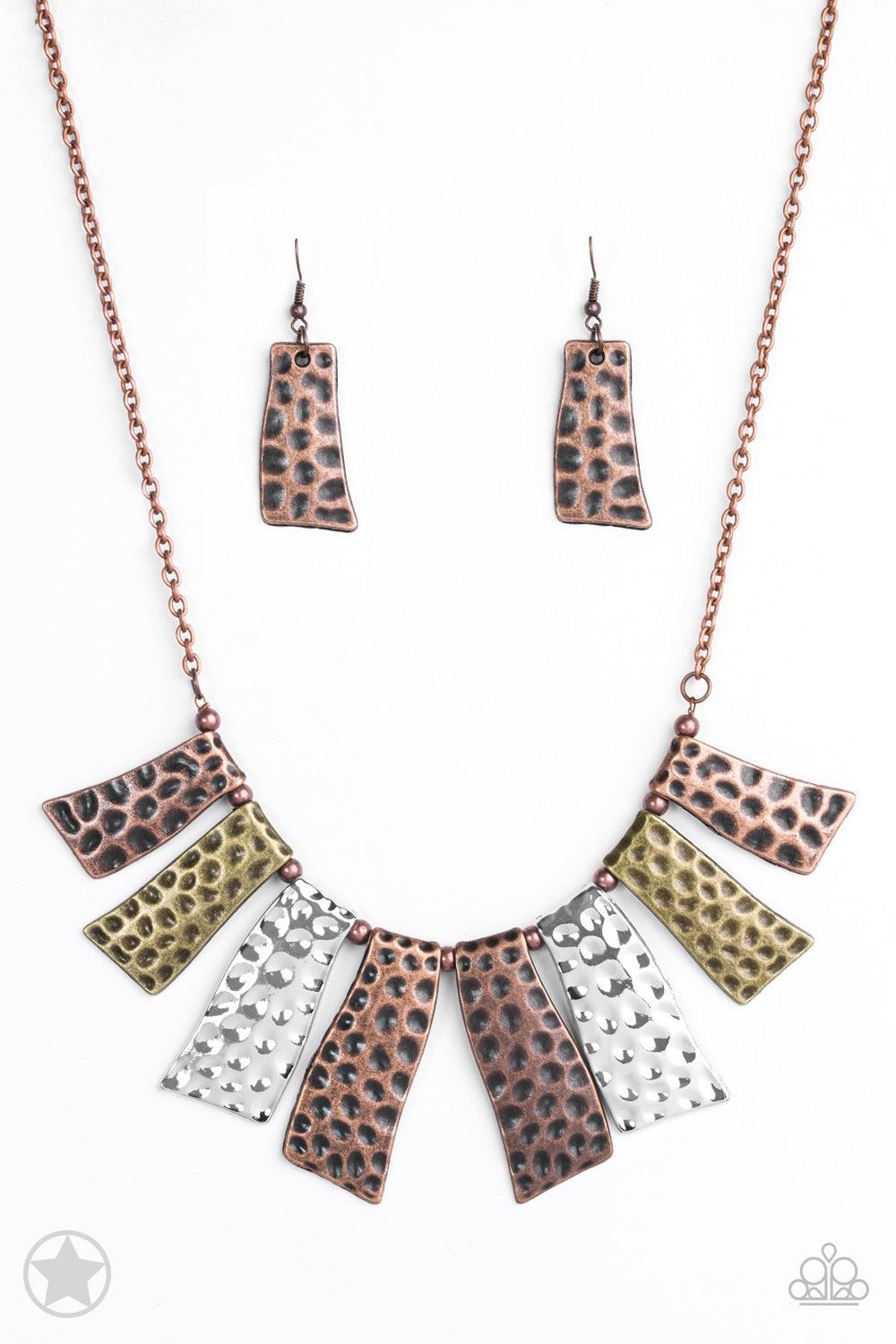 Paparazzi Accessories A Fan Of The Tribe Abstract wavy plates of copper, silver, and brass are texturized with eye-catching hammered divots and alternating copper beads along a copper chain. Features an adjustable clasp closure. Necklace