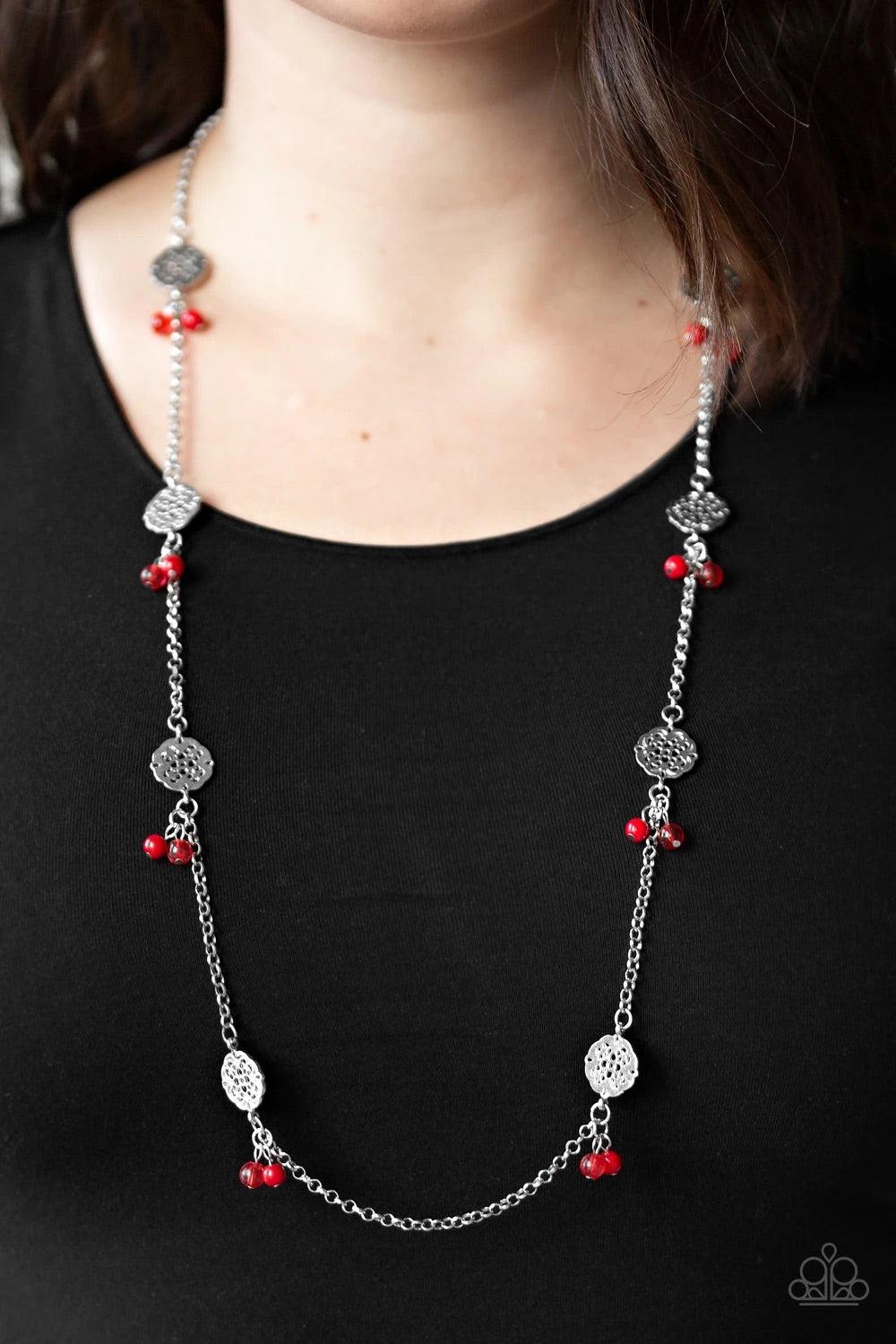 Paparazzi Accessories Color Boost - Red Featuring glassy and polished finishes, dainty red beads join ornate silver frames along a shimmery silver chain for a whimsical look. Features an adjustable clasp closure. Sold as one individual necklace. Includes