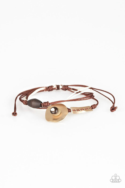 Paparazzi Accessories Trail Trek - Brown Layers of brown and white cording knot around abstract metallic plates and earthy wooden beads for a seasonal look. Features an adjustable sliding knot closure. Sold as one individual bracelet. Jewelry