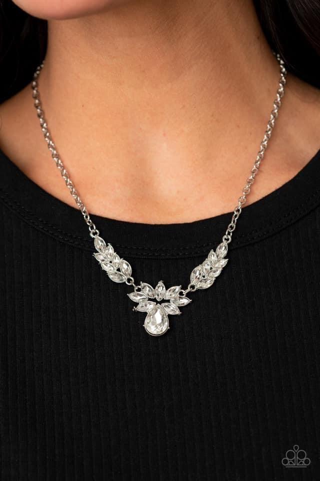 Paparazzi Accessories I Need Some HEIR - White Dotted with marquise style white rhinestones, leafy silver frames delicately connect into a vintage inspired pendant below the collar. An oversized white teardrop crowns the glittery centerpiece for an eye-ca
