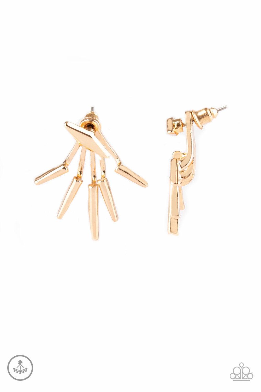 Paparazzi Accessories Extra Electric - Gold A gold diamond-shape frame attaches to a double-sided post, designed to fasten behind the ear. Radiating with matching gold frames, the double-sided post peeks out beneath the ear, creating an edgy fringe. Earri