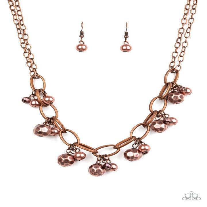 Paparazzi Accessories Malibu Movement - Copper Varying in size, a collection of faceted copper and pearly copper beads swing from a bold copper chain, creating a whimsical metallic fringe below the collar. Features an adjustable clasp closure. Sold as one
