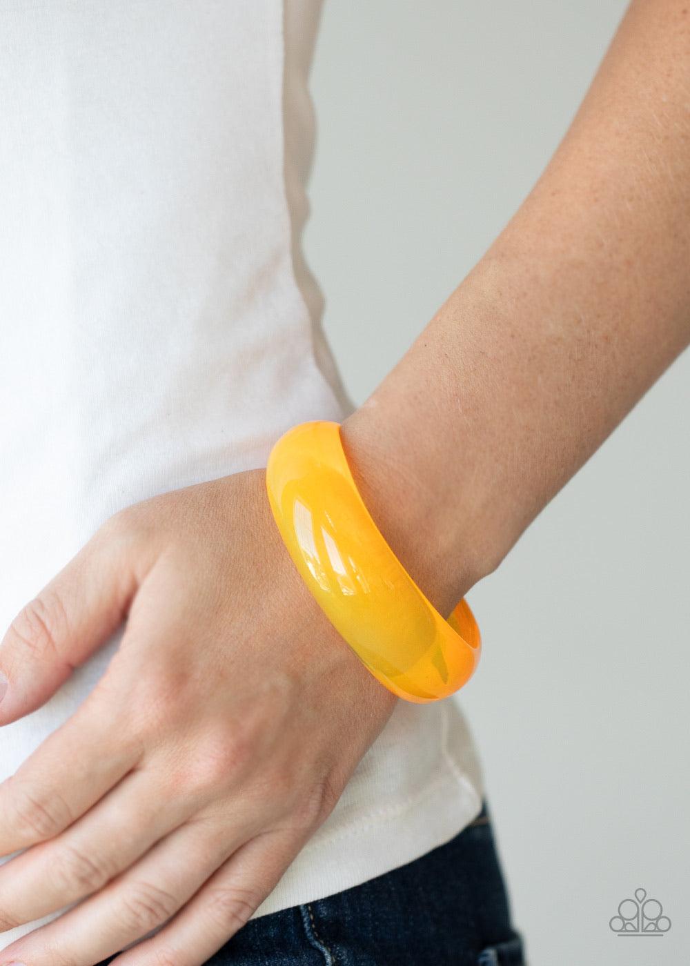 Paparazzi Accessories Major Material Girl - Orange A neon orange acrylic bangle slides along the wrist for a colorfully retro flair. The shiny bangle gradually widens at the top for a fabulous finish. Sold as one individual bracelet. Jewelry