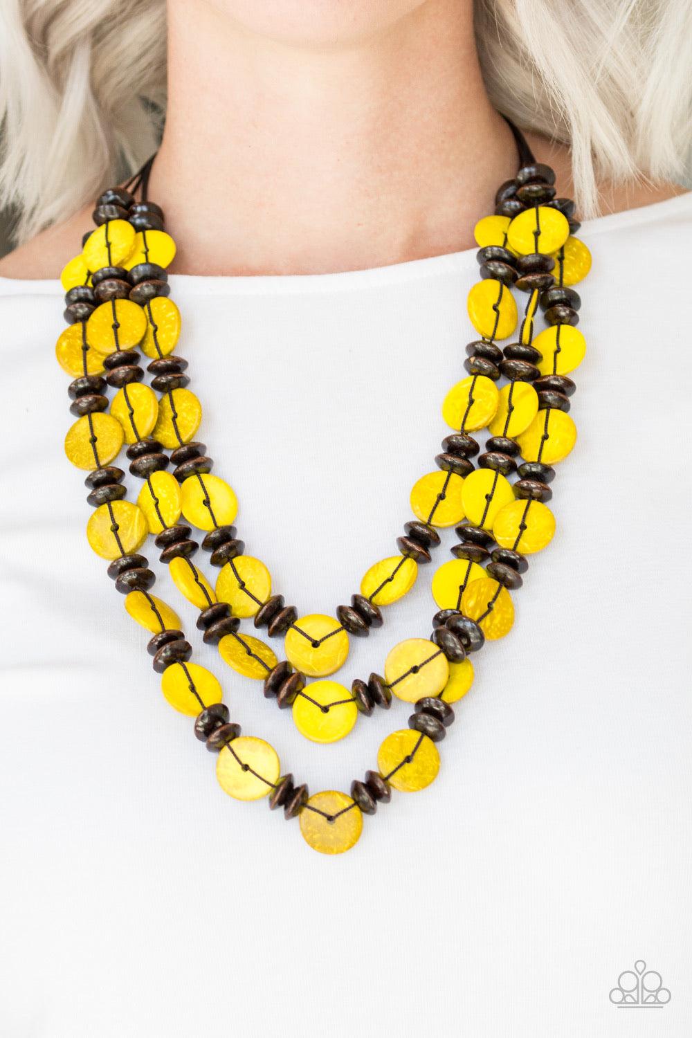 Paparazzi Accessories Key West Walkabout - Yellow Brushed in a colorful finish, rows of sunny yellow wooden discs and earthy brown beads are threaded along shiny brown cording for a summery look. Features a button loop closure. Jewelry