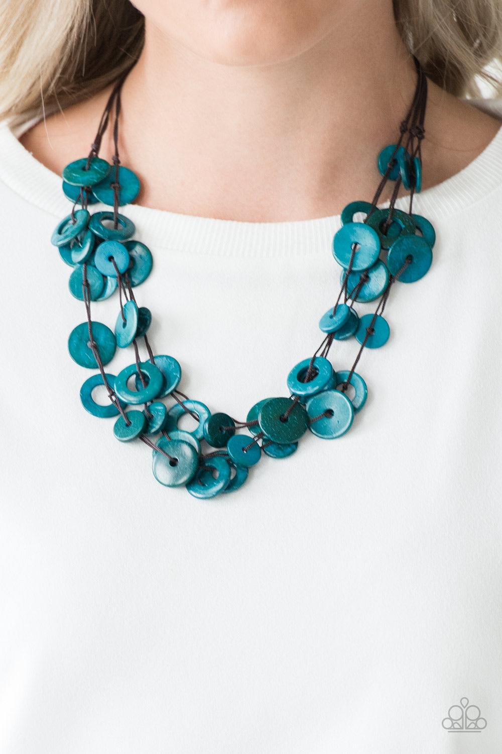 Paparazzi Accessories Wonderfully Walla Walla - Blue Shiny brown cording knots around mismatched blue wooden beads, creating vivacious layers. Features a button loop closure. Jewelry