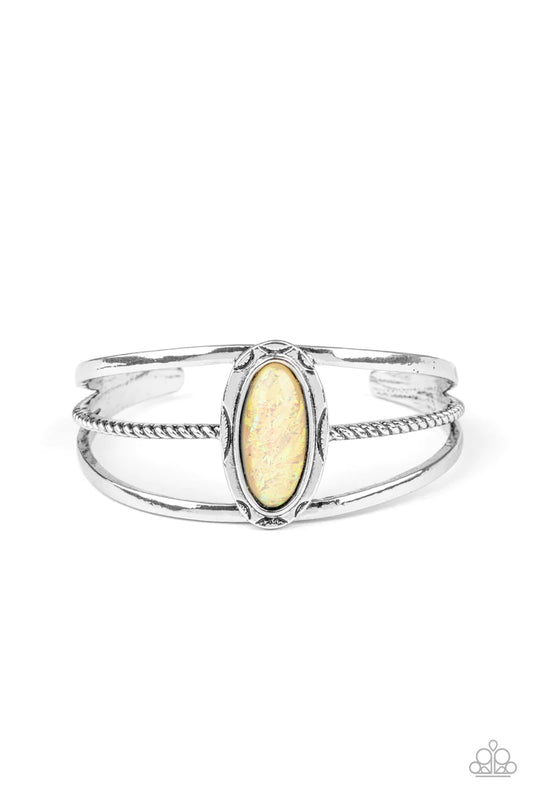 Paparazzi Accessories Stone Sahara - Yellow A glittery yellow stone is pressed into a decorative silver frame atop a mismatched layered cuff, creating a seasonal sparkle around the wrist. Sold as one individual bracelet. Jewelry