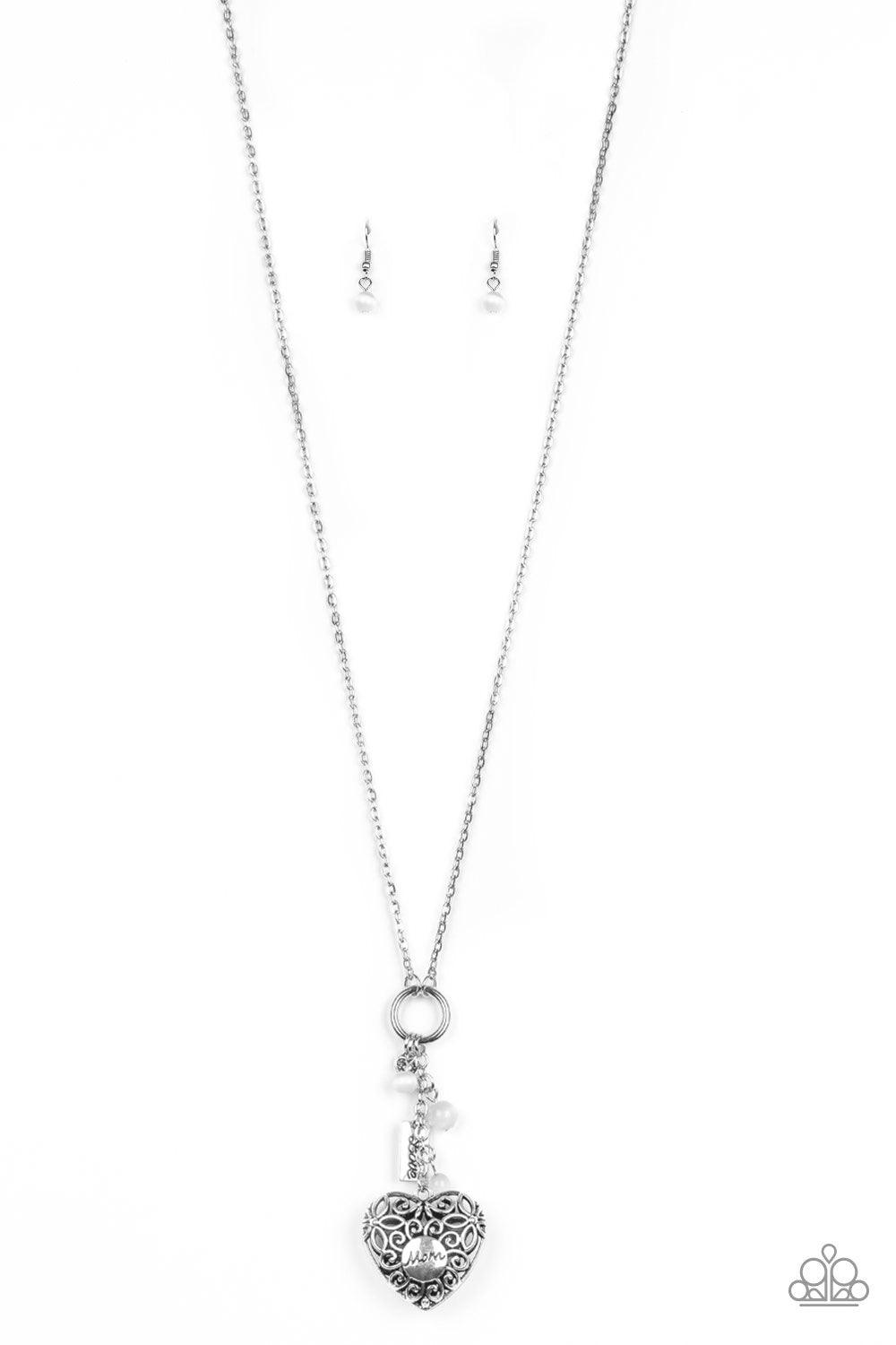 Paparazzi Accessories Mom Hustle - White Infused with white cat's eye accents, a dainty silver heart, rectangular frame stamped with "love", and a locket-like heart stamped with the word "mom", collect at the bottom of a silver chain for a vintage inspire