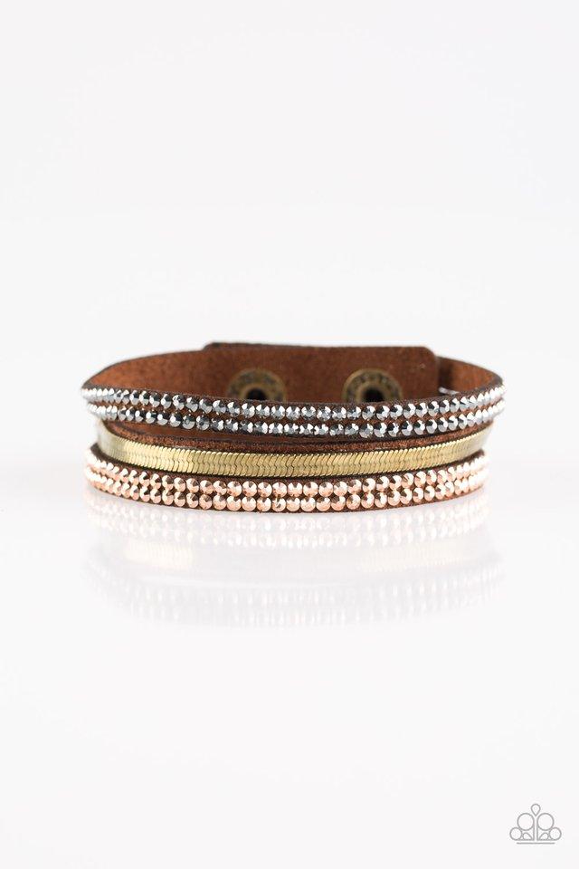 Paparazzi Accessories I Mean Business - Multi A brown suede band is spliced into three strands featuring rows of glittery hematite rhinestones, flat brass chain, and faceted metallic rhinestones for a glamorous look. Features an adjustable snap closure. S