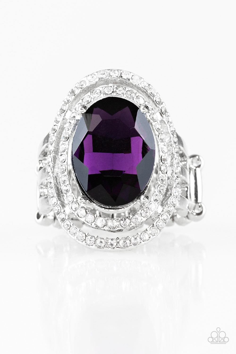 Paparazzi Accessories Making History - Purple A glittery purple gem sits atop stacked silver frames radiating with glassy white rhinestones for a timeless look. Features a stretchy band for a flexible fit. Jewelry