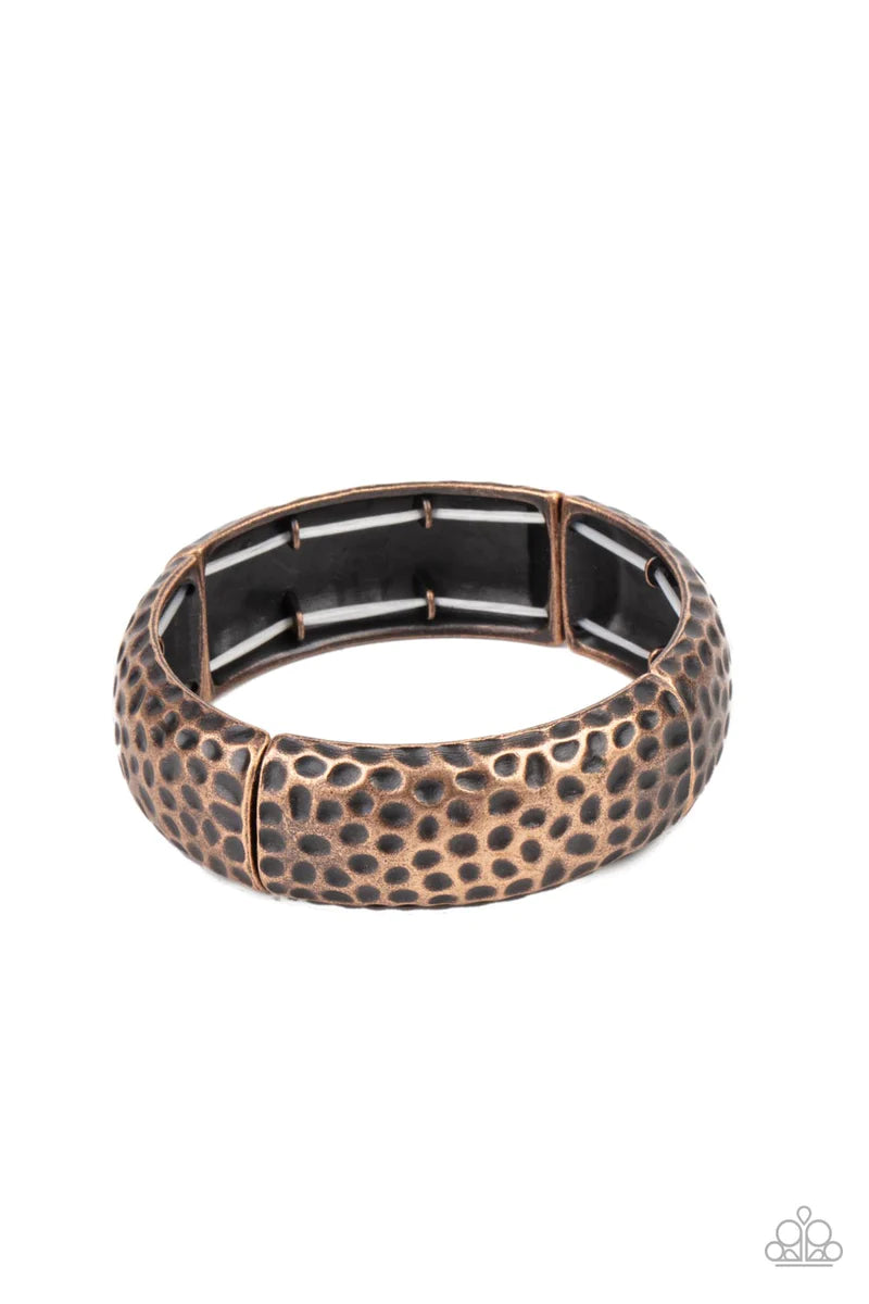 Paparazzi Accessories Come Under The Hammer - Copper Hammered in rustic textures, curved copper rectangular frames are threaded along stretchy bands around the wrist for an artisan inspired look. Sold as one individual bracelet. Jewelry