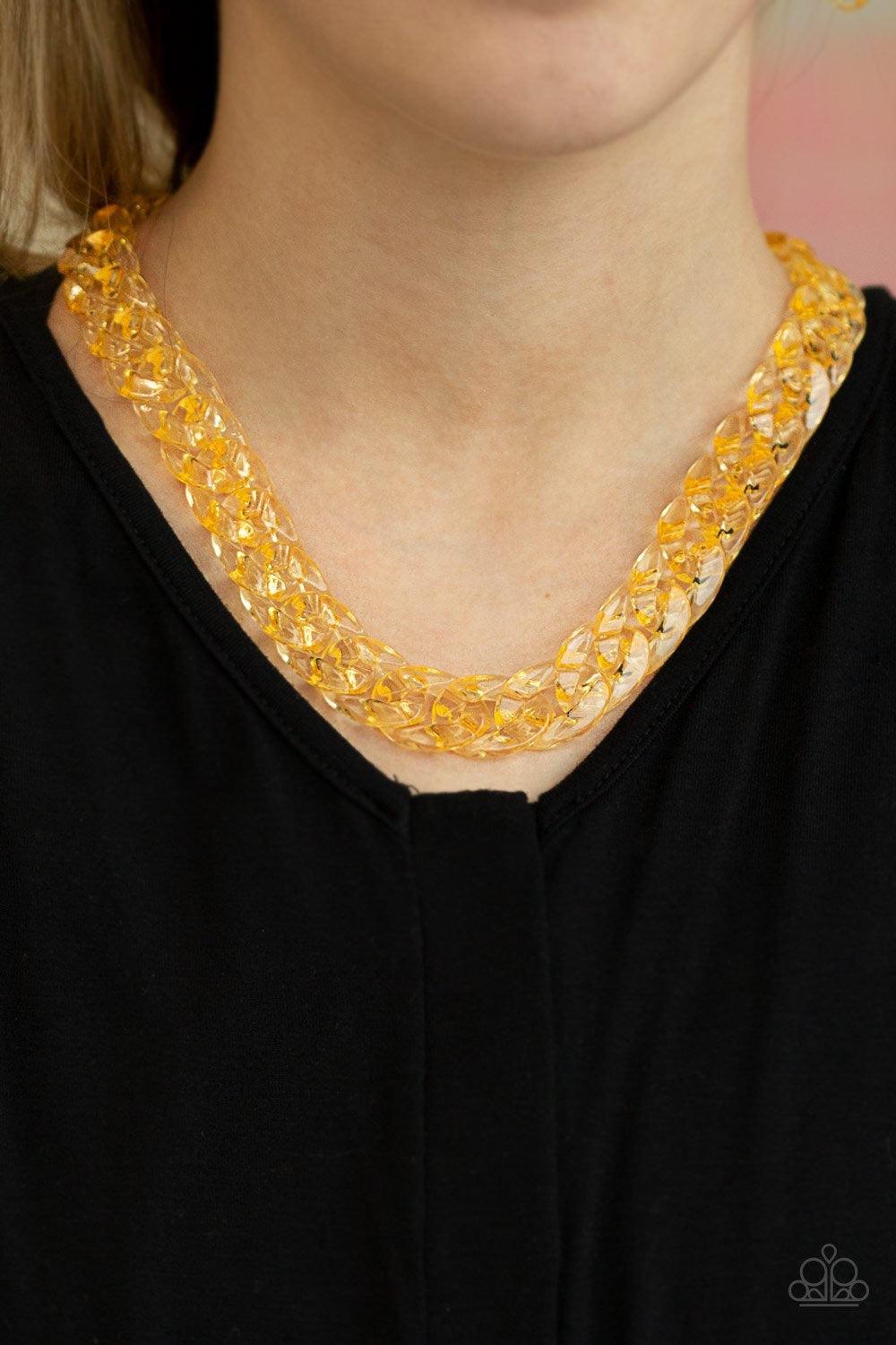 Paparazzi Accessories Put It On Ice - Gold Glassy gold links connect below the collar for a bold statement-making look. Features an adjustable clasp closure. Jewelry
