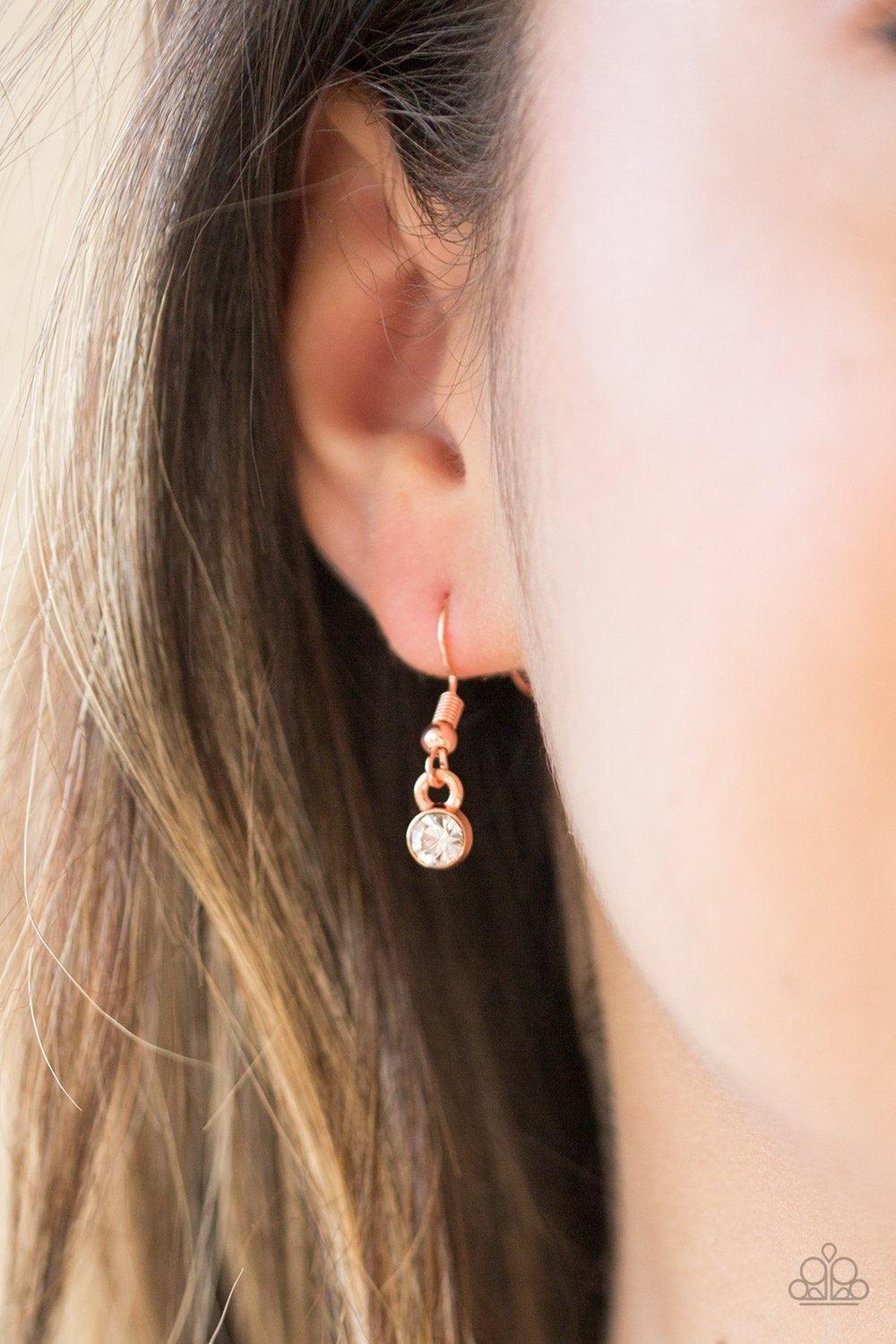 Paparazzi Accessories Classically Classic - Copper Encrusted in glassy white rhinestones, a dainty shiny copper pendant delicately bows below the collar in a timeless fashion. Features an adjustable clasp closure. Jewelry