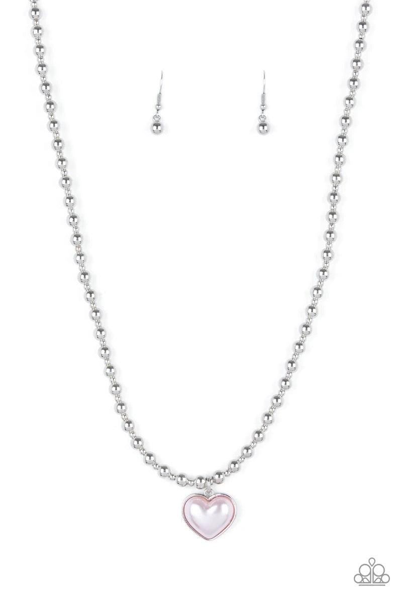 Paparazzi Accessories Heart Full of Fancy - Pink Featuring a pearly pink center, a charming heart pendant suspends from a strand of silver beads below the collar for a romantic flair. Features an adjustable clasp closure. Sold as one individual necklace.