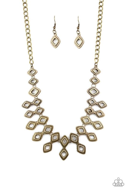 Paparazzi Accessories Geocentric - Brass Brushed in an antiqued shimmer, glistening diamond-shaped brass frames link below the collar, coalescing into an edgy geometric fringe. Features an adjustable clasp closure. Sold as one individual necklace. Include