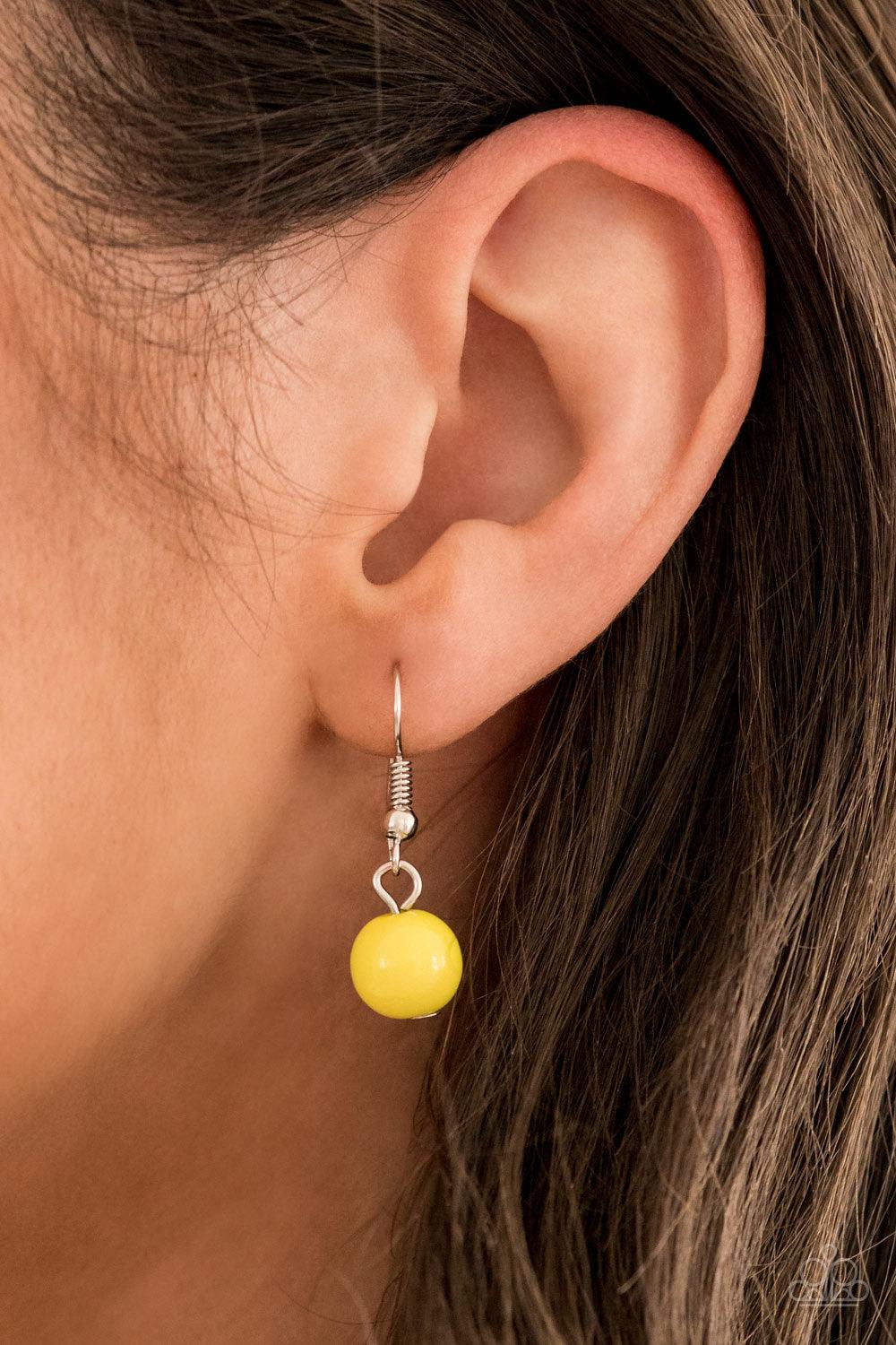 Paparazzi Accessories Bohemian Bombshell - Yellow Embossed in wavy textures, shiny silver discs link with bubbly yellow beaded frames below the collar, creating a colorful statement piece. Features an adjustable clasp closure. Jewelry