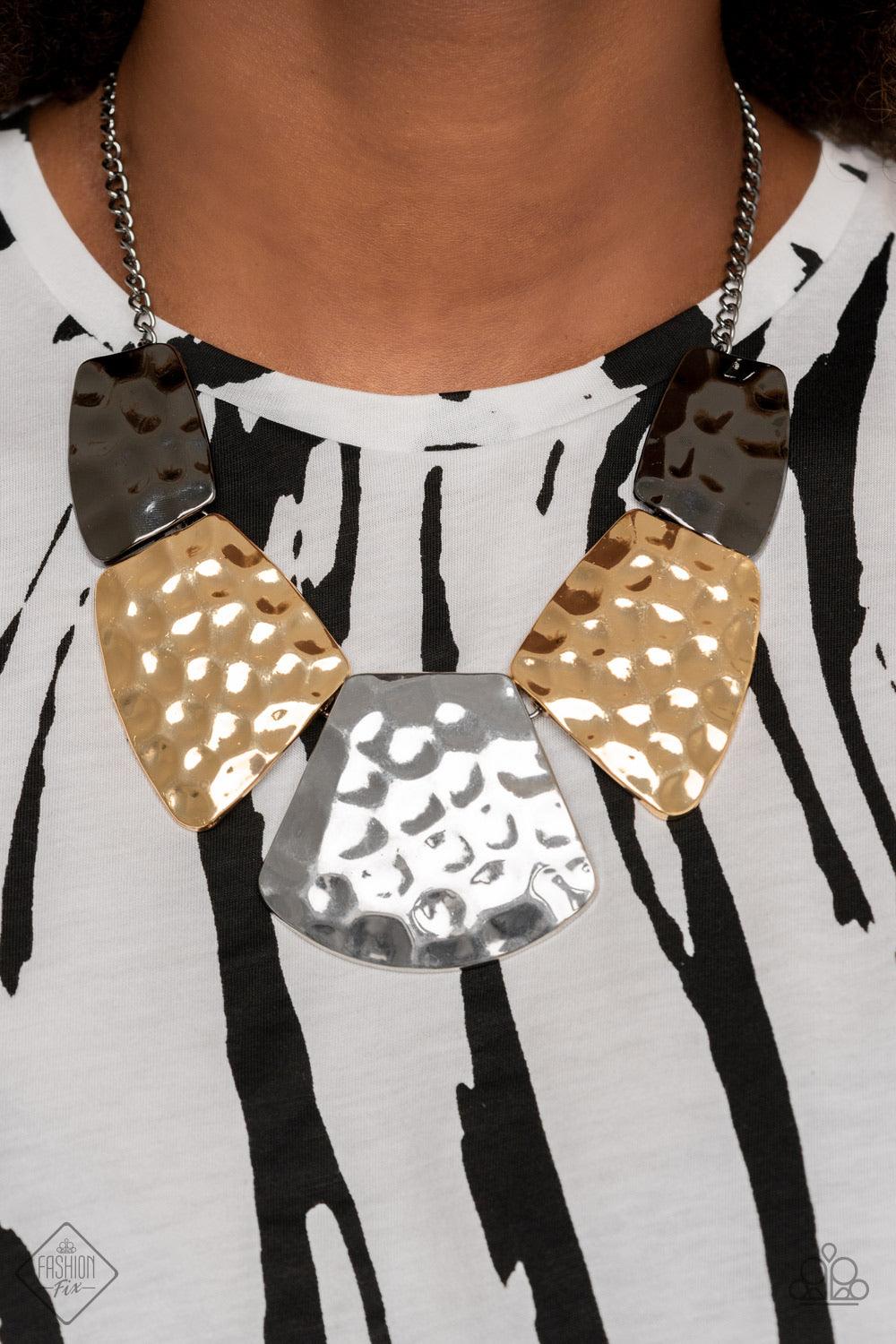 Paparazzi Accessories HAUTE Plates ~Multi A collection of oversized silver, gold, and gunmetal plates connect below the collar, creating a fearless statement piece. Each metallic plate is hammered in texture, adding industrial grit and endless sheen to th