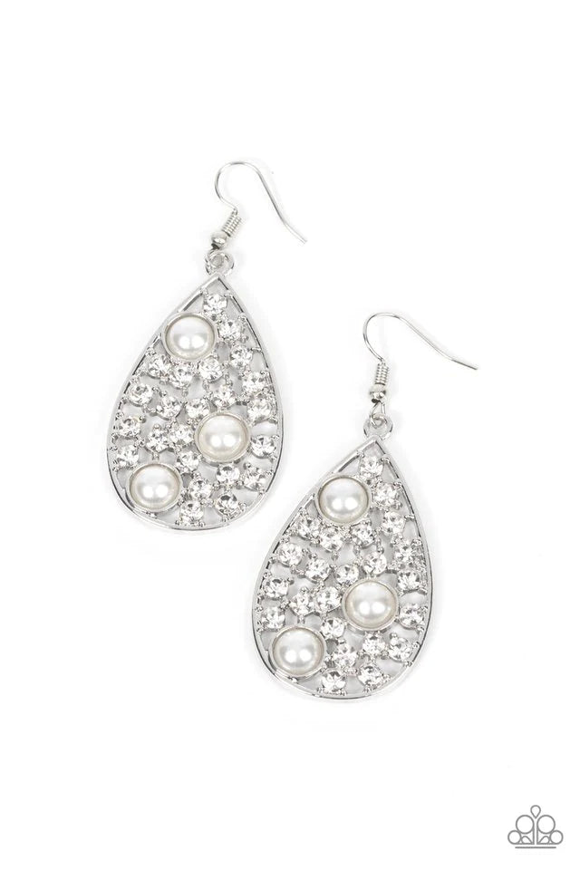 Paparazzi Accessories Bauble Burst - White Encased in pronged silver fittings, a glitzy collection of glassy white rhinestones join pearly white beads inside of a shiny silver teardrop for a glamorous finish. Earring attaches to a standard fishhook fittin