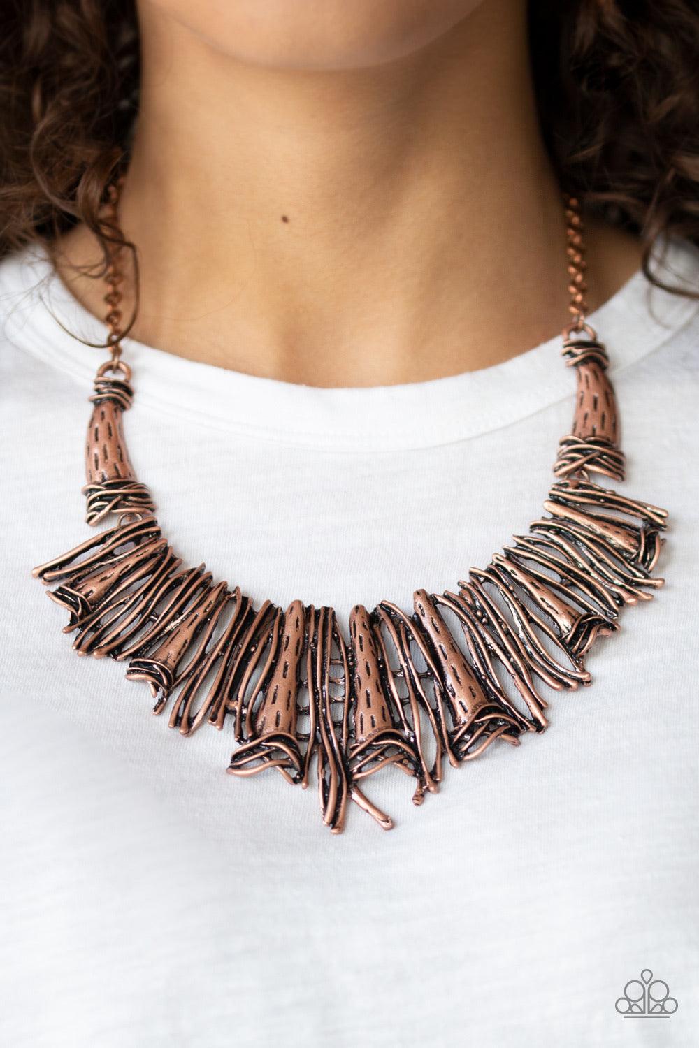 Paparazzi Accessories In the MANE-stream - Copper Brushed in an antiqued shimmer, a collision of glistening copper bars and hammered copper accents coalesce into an abstract statement piece below the collar for a fierce industrial look. Features an adjust