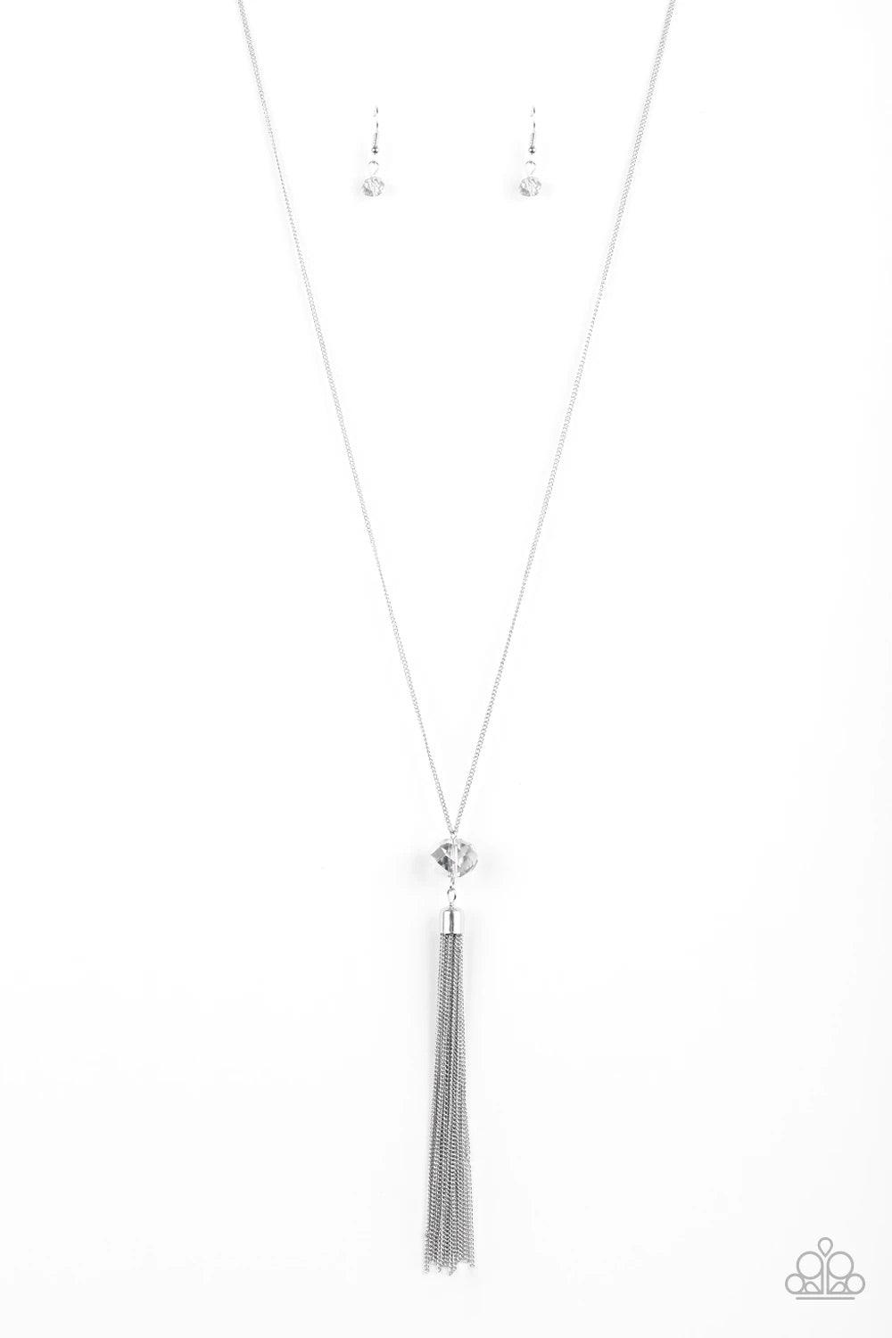 Paparazzi Accessories Socialite of the Season - Silver Splashed in metallic shimmer, a smoky crystal-like bead swings from the bottom of a lengthened silver chain, giving way to a shimmering silver tassel for a glamorous finish. Features an adjustable cla