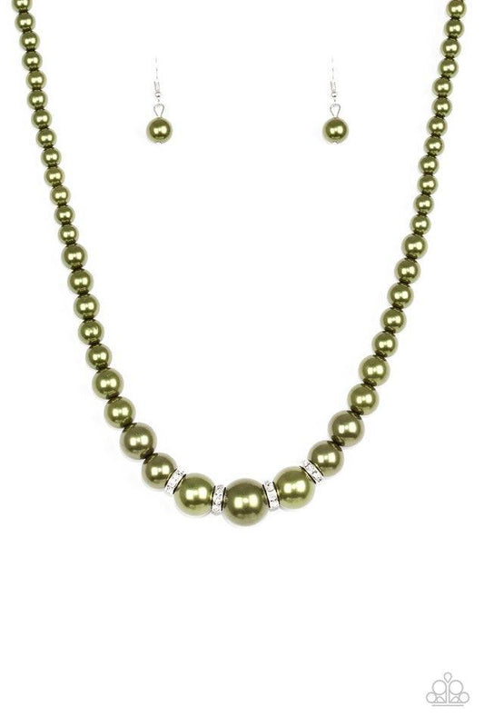 Paparazzi Accessories Party Pearls - Green Gradually increasing in size, luminescent green pearls trickle below the collar for a classic look. Encrusted in dazzling white rhinestones, glittery rings are sprinkled between the pearls for a timeless finish.