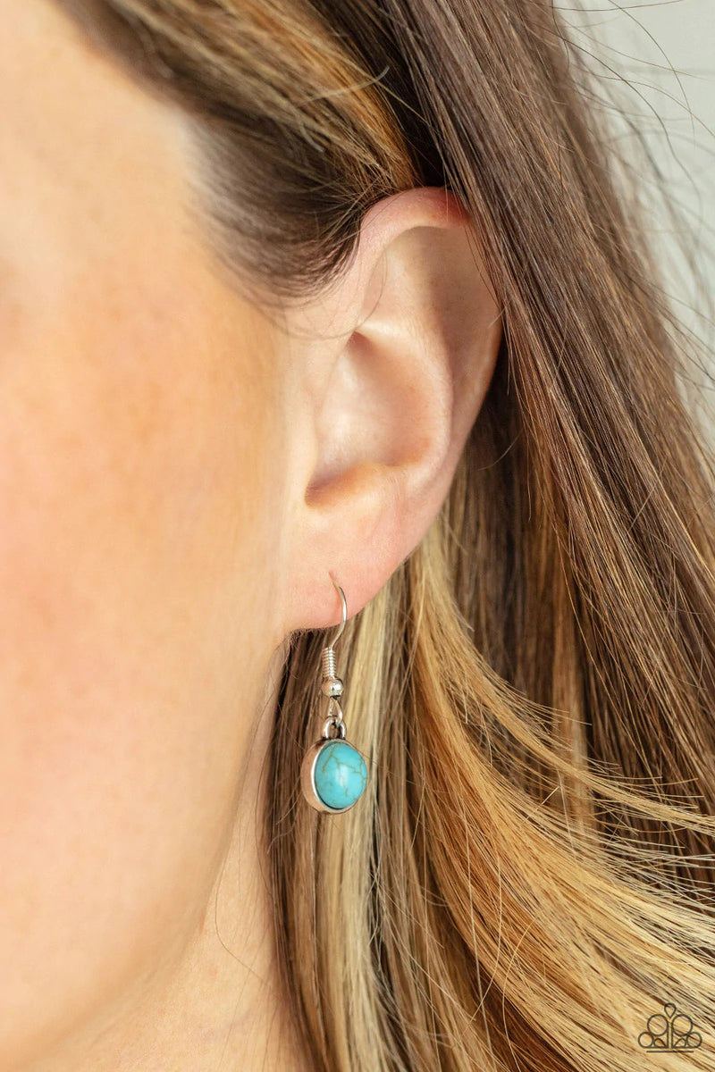 Paparazzi Accessories Heavenly Teardrops - Blue Encased in sleek silver frames, a refreshing collection of round and teardrop turquoise stones delicately link below the collar for a whimsical pop of color. Features an adjustable clasp closure. Sold as one