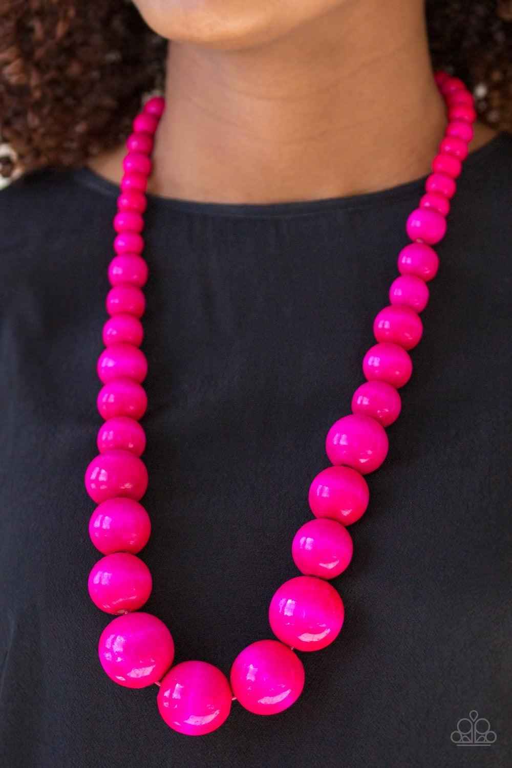 Paparazzi Accessories Effortlessly Everglades - Pink Gradually increasing in size near the center, vivacious pink wooden beads are threaded along a pink string for a summery look. Features an adjustable sliding knot closure. Jewelry