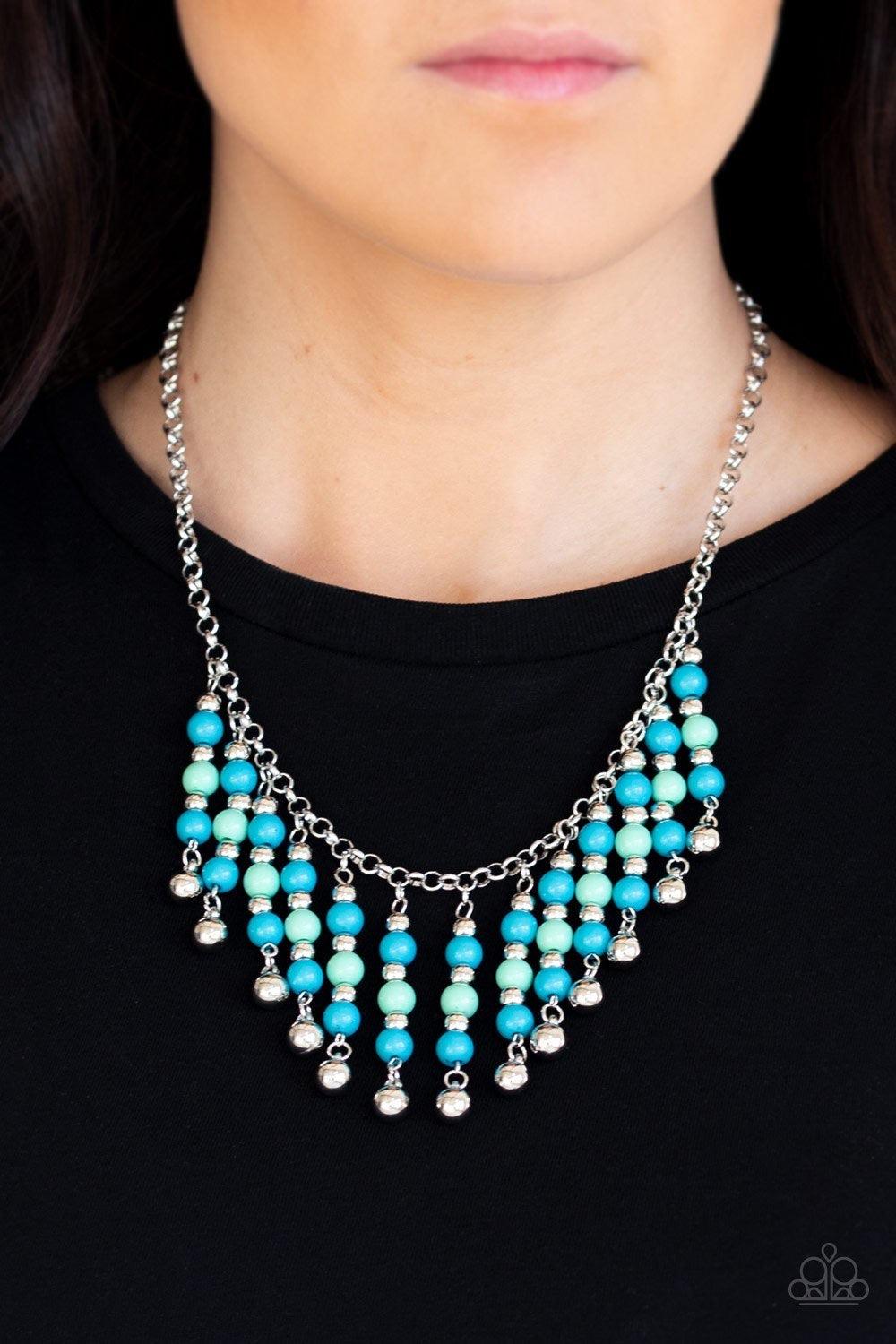 Paparazzi Accessories Your SUNDAE’S Best - Blue A collection of blue, green, and silver beads are threaded along metallic rods as they swing from the bottom of a shimmery silver chain, creating a flirtatious fringe below the collar. Features an adjustable