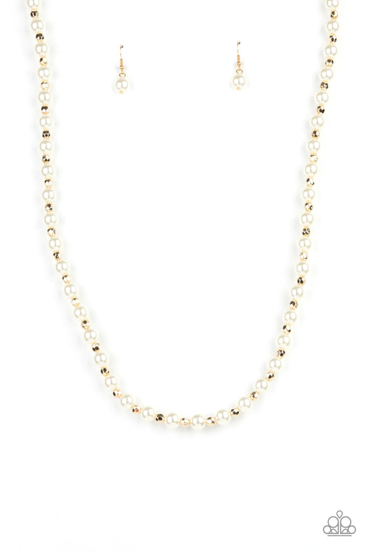 Paparazzi Accessories Nautical Novelty - Gold Classic white pearls and faceted gold beads alternate along an invisible wire below the collar, creating a timeless twist. Features an adjustable clasp closure. Sold as one individual necklace. Includes one pa