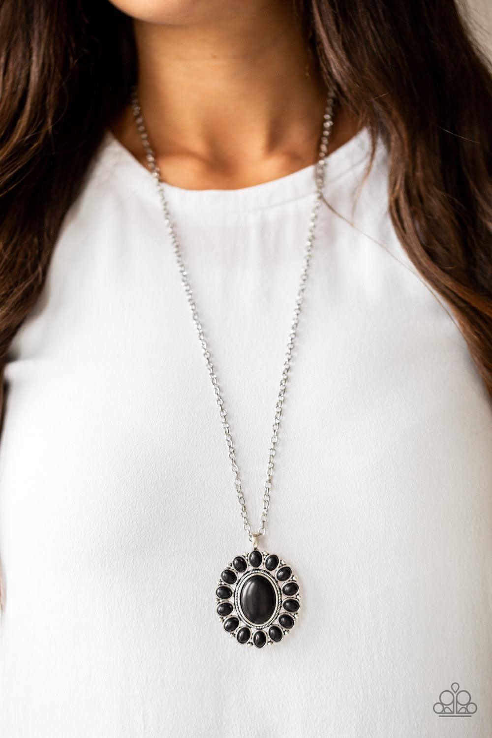 Paparazzi Accessories Rancho Roamer - Black Radiating with black stone accents, a dramatic floral pendant swings from the bottom of a lengthened silver chain for a seasonal look. Features an adjustable clasp closure. Jewelry