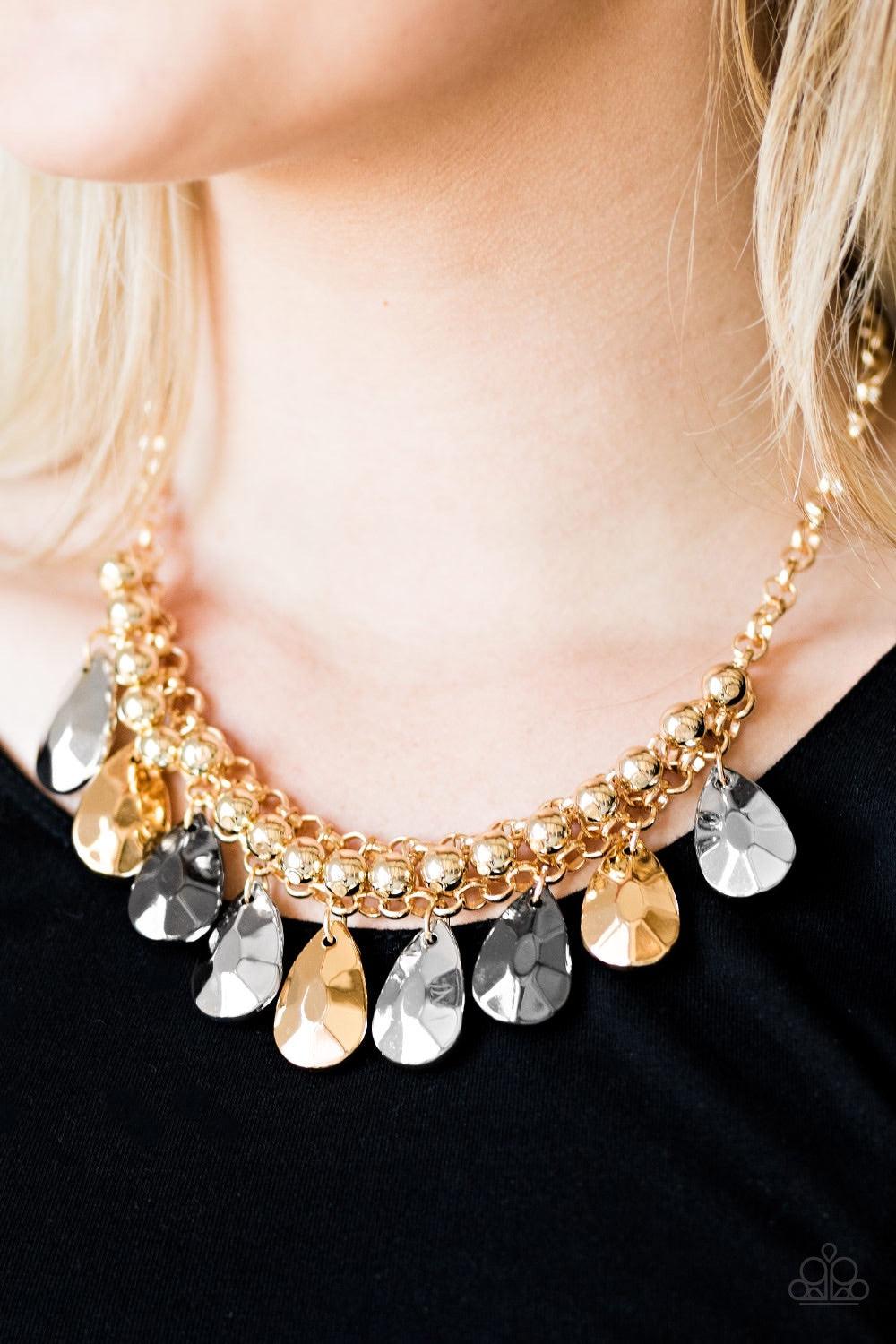 Paparazzi Accessories La DIVA Loca - Multi Faceted silver, gold, and gunmetal teardrops trickle from the bottom of interwoven gold chains, creating a dramatic fringe below the collar. Classic gold beads swing from the bold chains, adding a timelessly chic