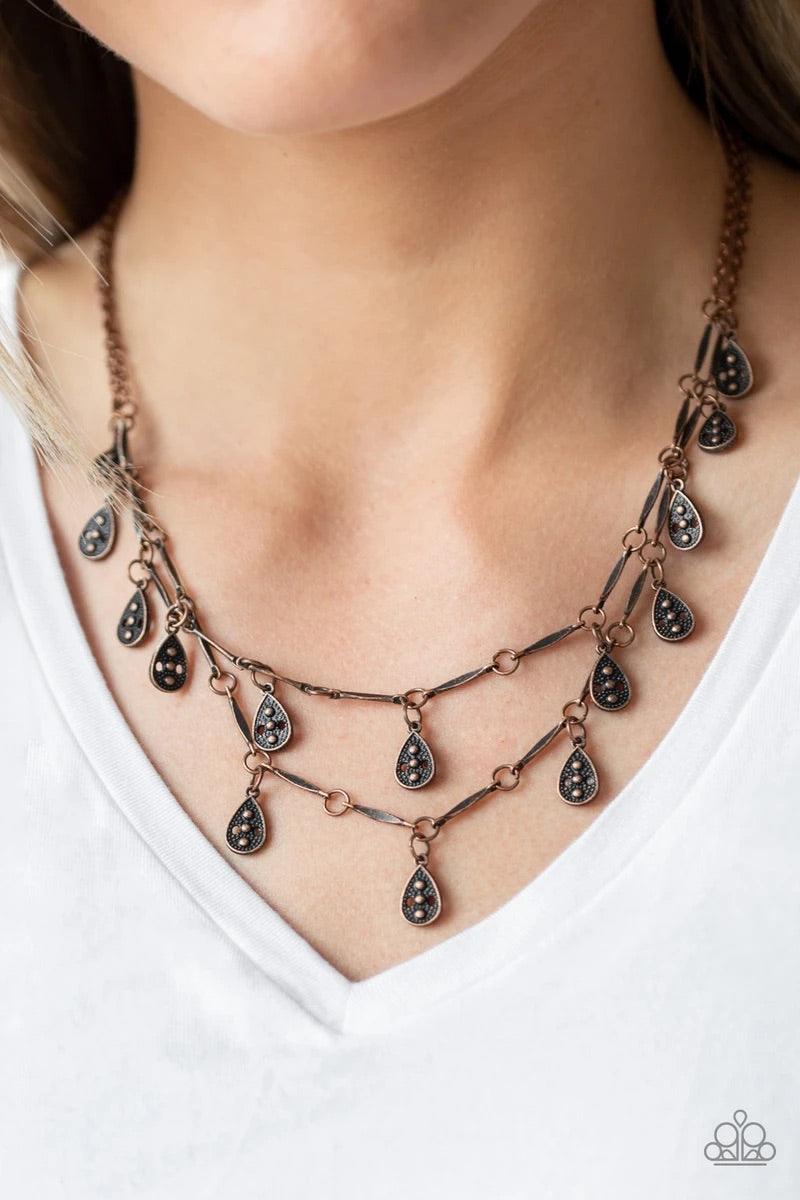 Paparazzi Accessories Galapagos Gypsy - Copper Glistening copper rods and ornate teardrops link below the collar in two rows, creating a playful fringe. Features an adjustable clasp closure. Sold as one individual necklace. Includes one pair of matching e
