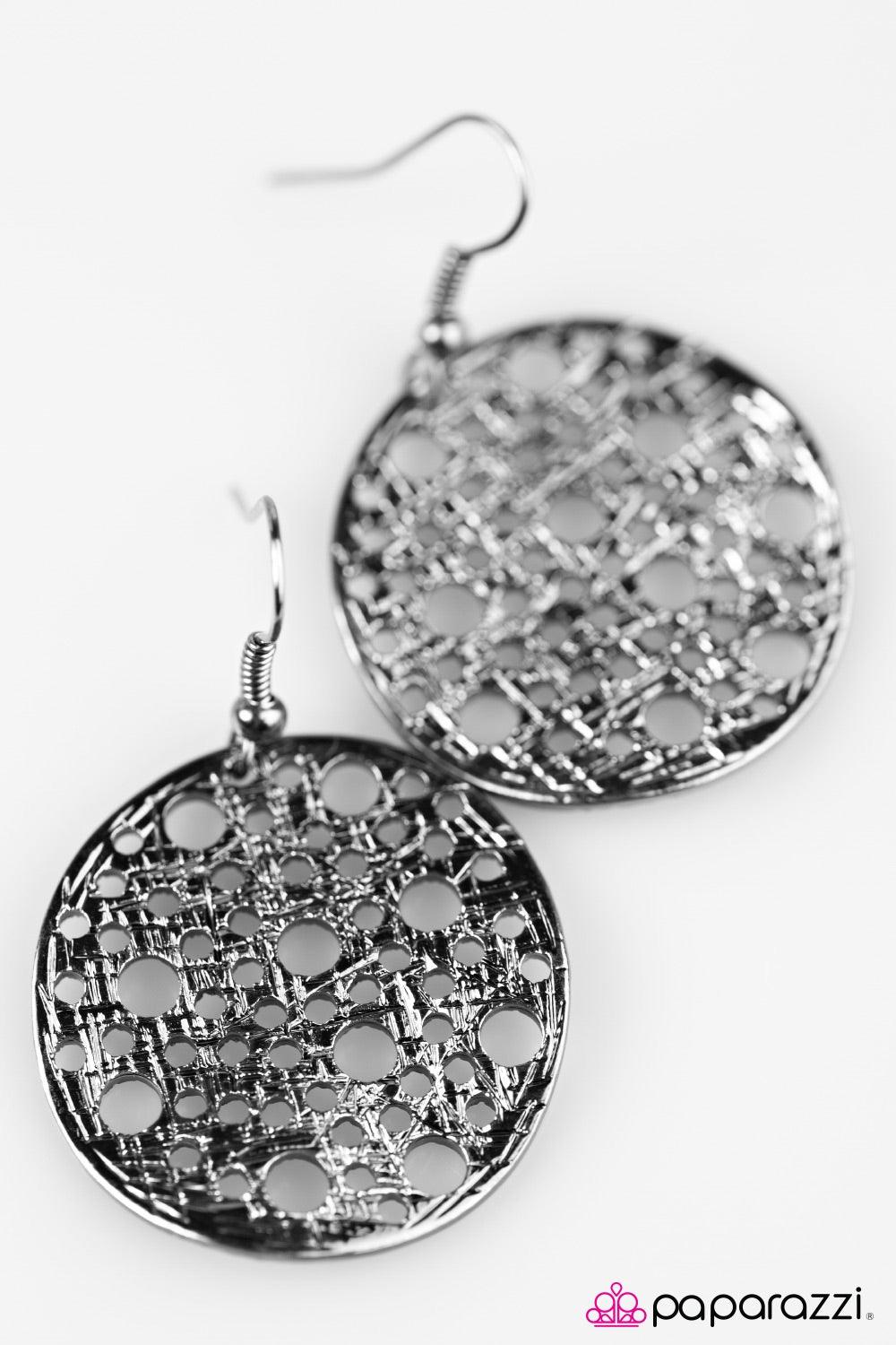 Paparazzi Accessories The HOLE Wide World - Black Brushed in a shiny shimmer, a delicately hammered gunmetal disc swings from the ear. Etched in tactile textures, the gunmetal frame is accented with round holes for an airy finish. Earring attaches to a st